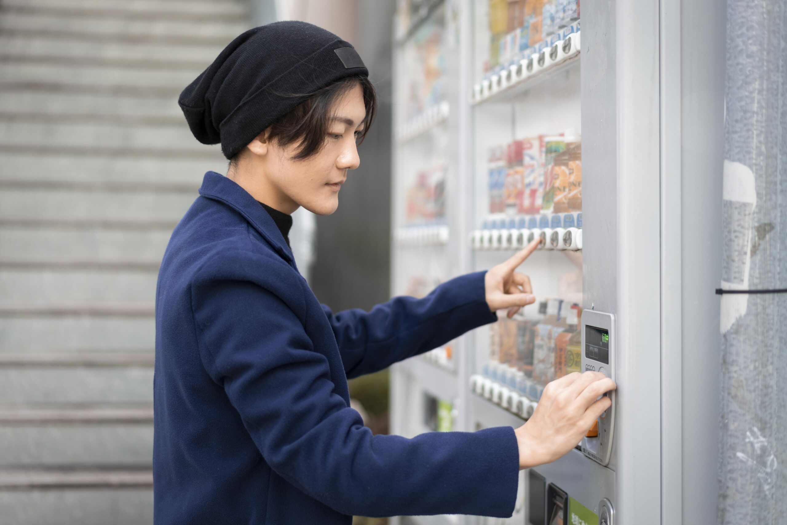 man using a vending machine